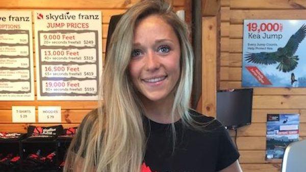 a person standing in front of a store