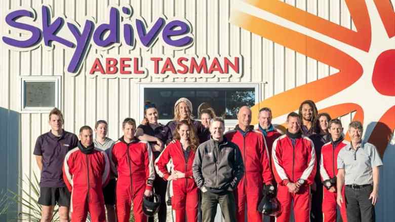 Skydive_Abel_Tasman_Fun_Crew_2016 a group of people posing for a photo