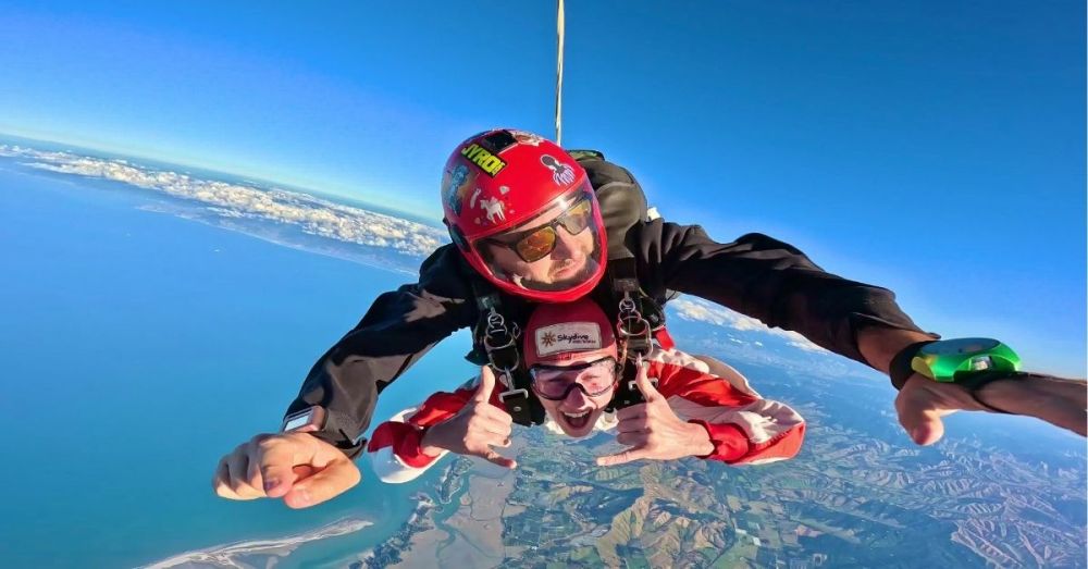 a man riding a snow board in the water
