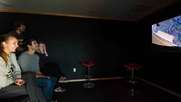 Skydive_Abel_Tasman_How_It_Works_0004 a person sitting in a room