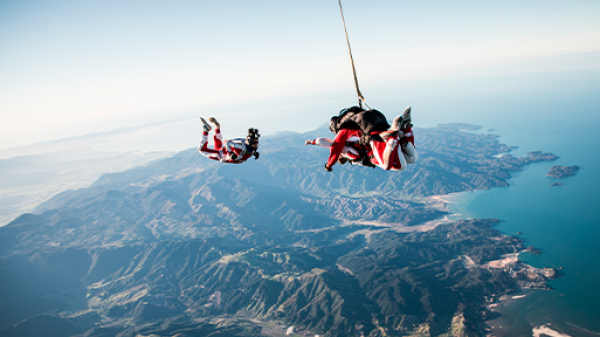 a view of water and a mountain in the background