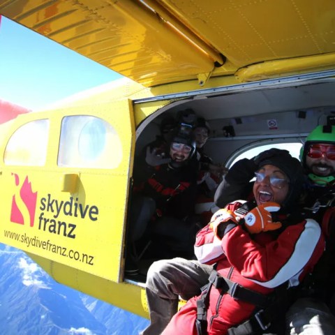 Tandem Skydivers right before they jump off the plane at 10,000 ft above Franz.