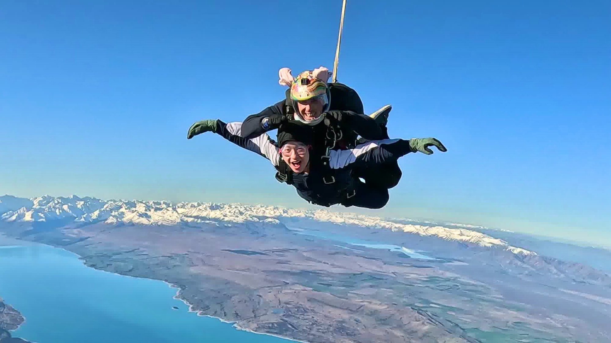 Skydive Mount Cook 16500 Herom Image 9 a man flying through the air