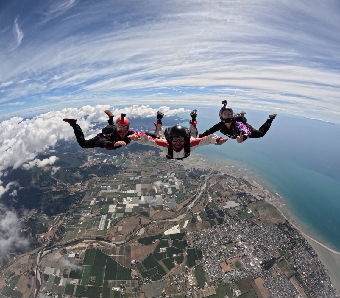 a group of people riding on top of a mountain